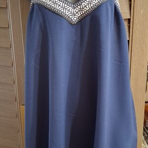 Elegant Blue Top with Geometric Trim